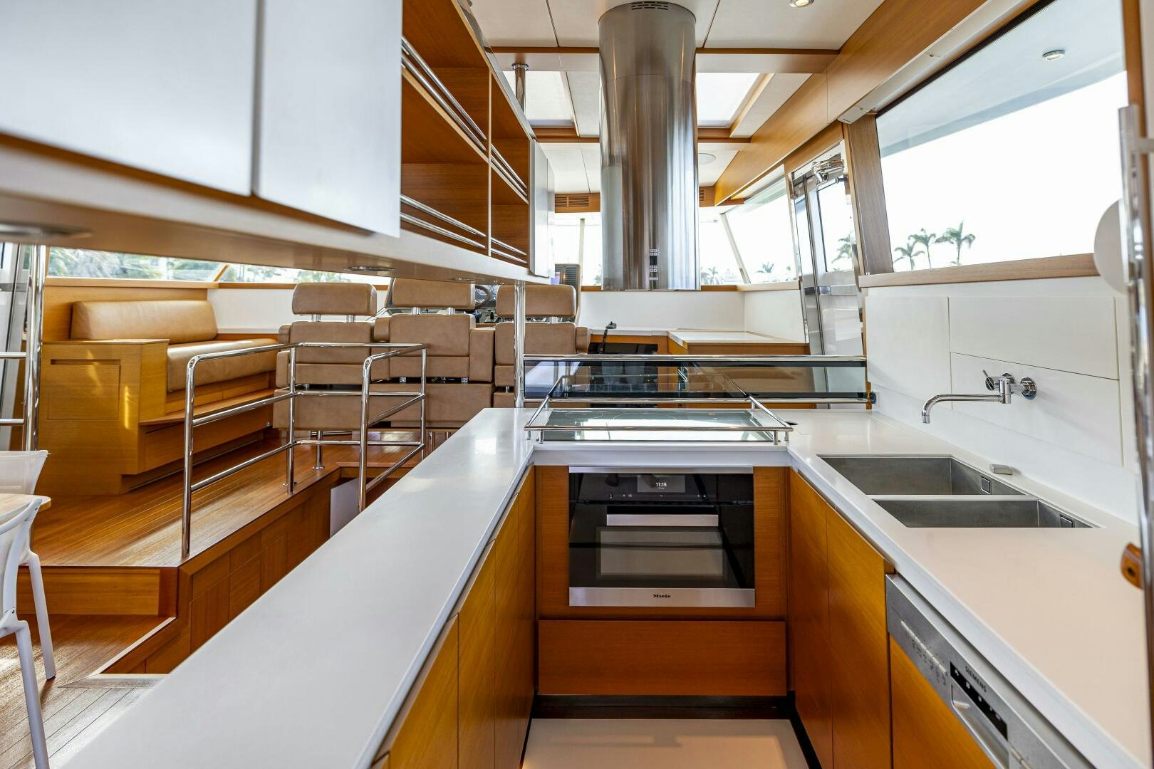 a kitchen with a stove and sink aboard SEABISCUIT Yacht for Sale