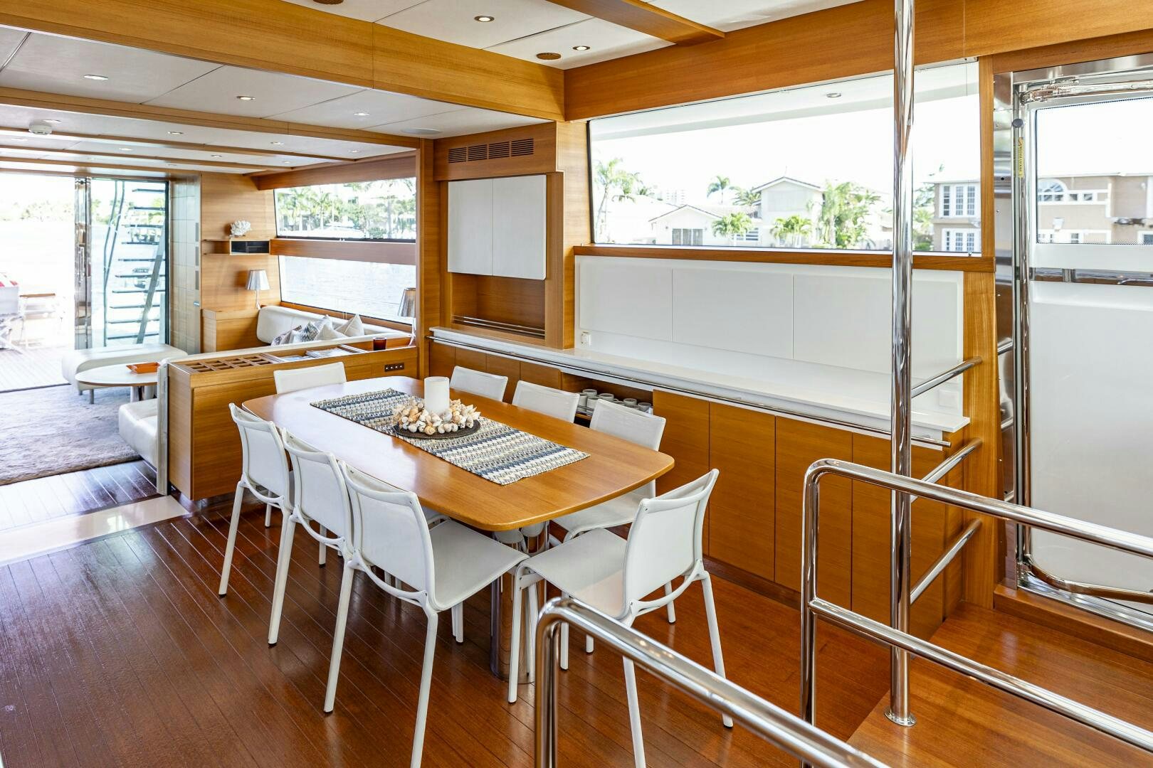 a room with a table and chairs aboard SEABISCUIT Yacht for Sale