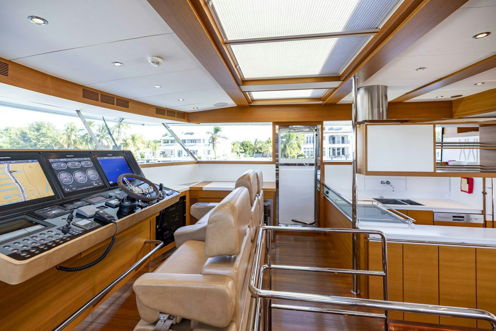 a room with computers and chairs aboard SEABISCUIT Yacht for Sale