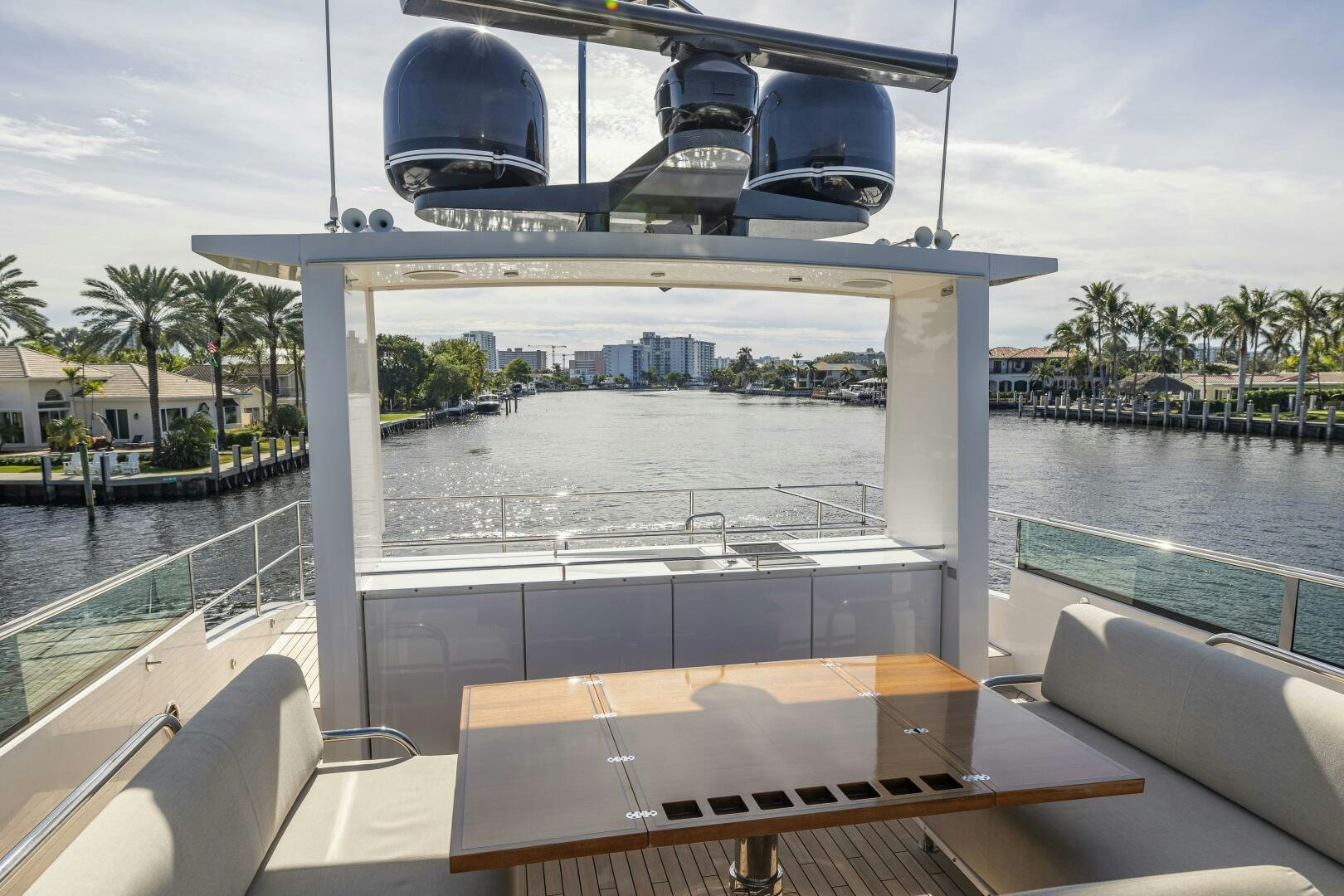 a large pool with a large building in the background aboard SEABISCUIT Yacht for Sale