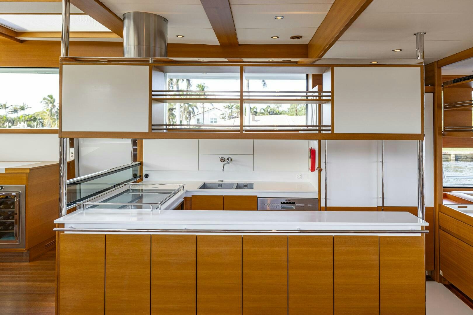 a kitchen with wooden cabinets aboard SEABISCUIT Yacht for Sale