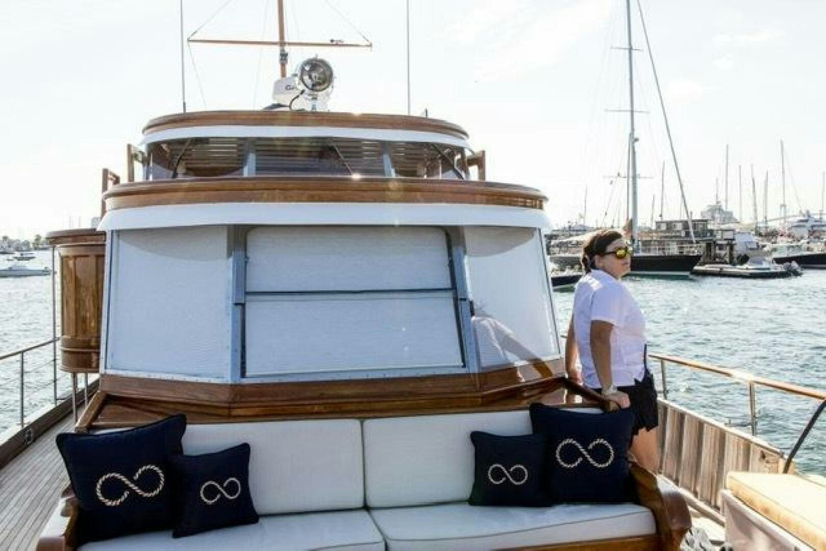 a person standing on a boat aboard TIMELESS Yacht for Sale