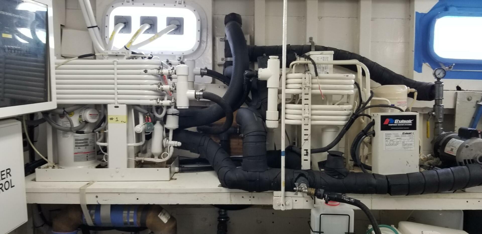 a machine with a person's legs and legs aboard TIMELESS Yacht for Sale
