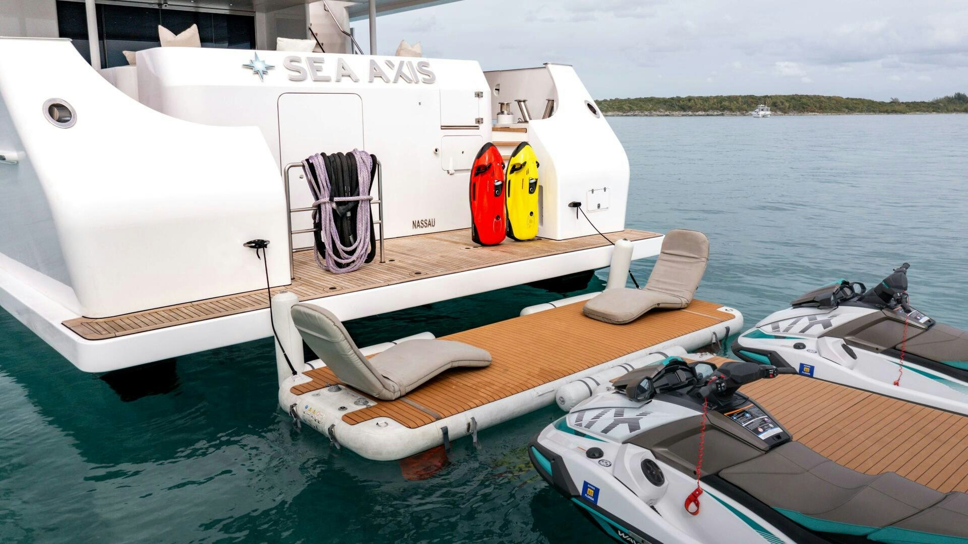 a boat with a motor attached to it aboard SEA AXIS Yacht for Sale