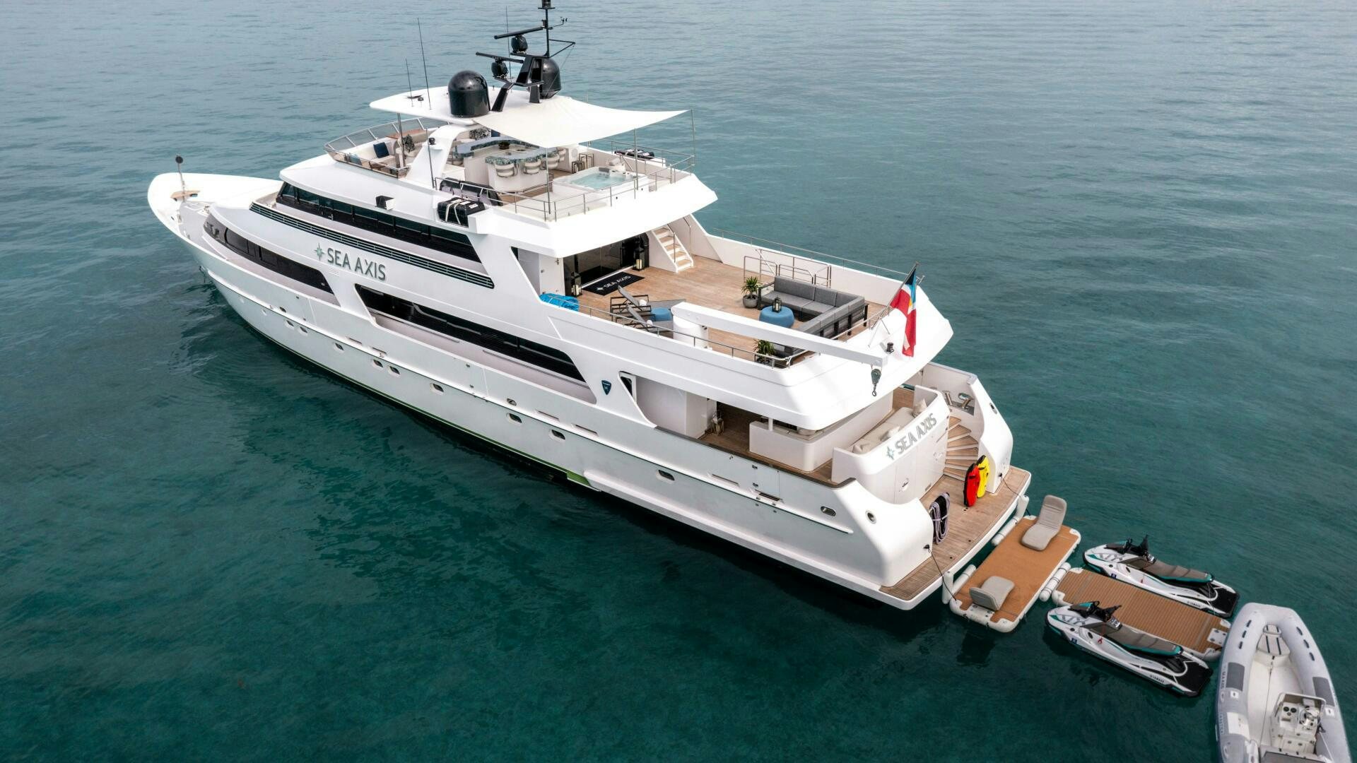 a large white ship on the water aboard SEA AXIS Yacht for Sale
