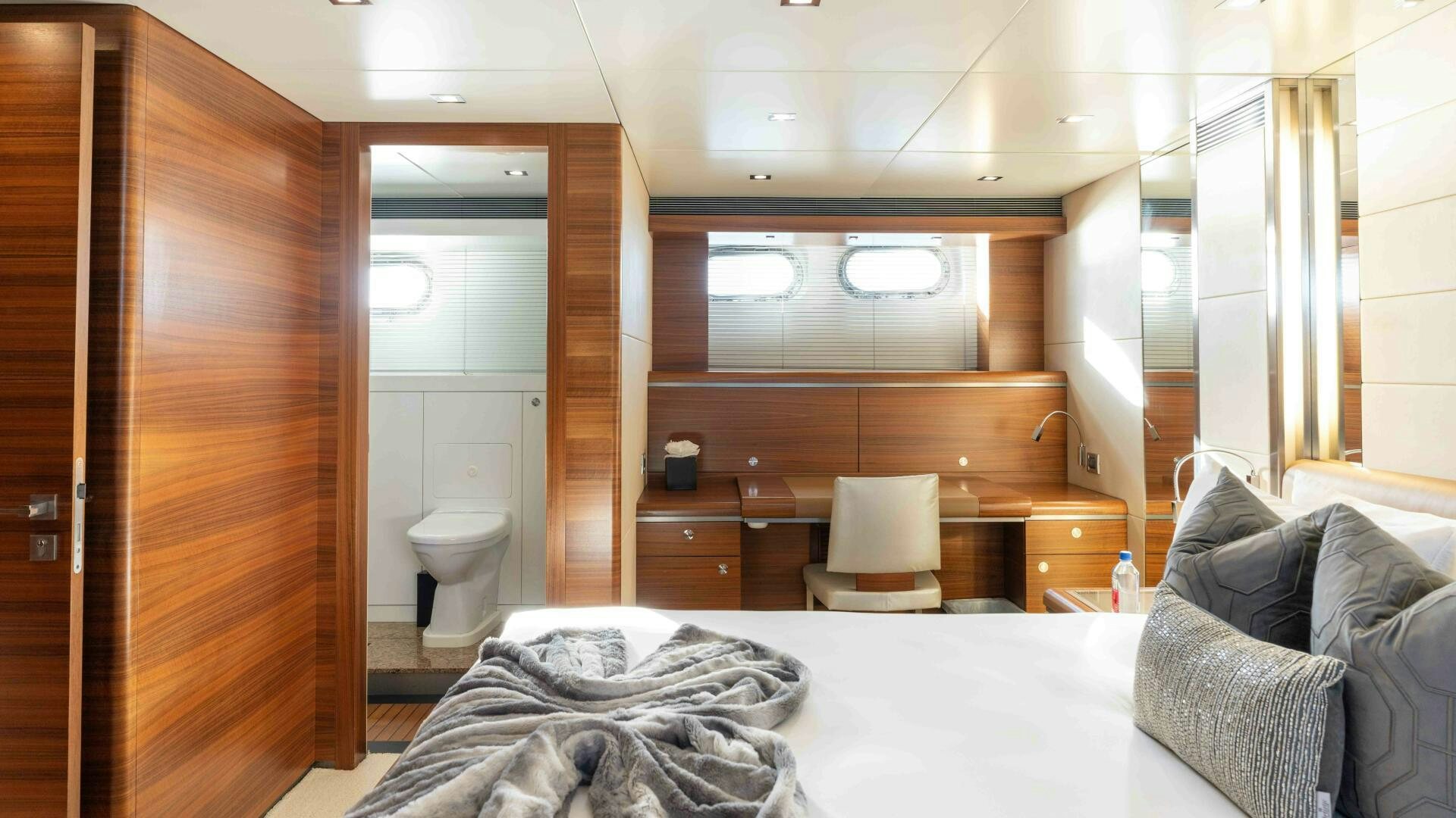 a bed in a room aboard SEA AXIS Yacht for Sale
