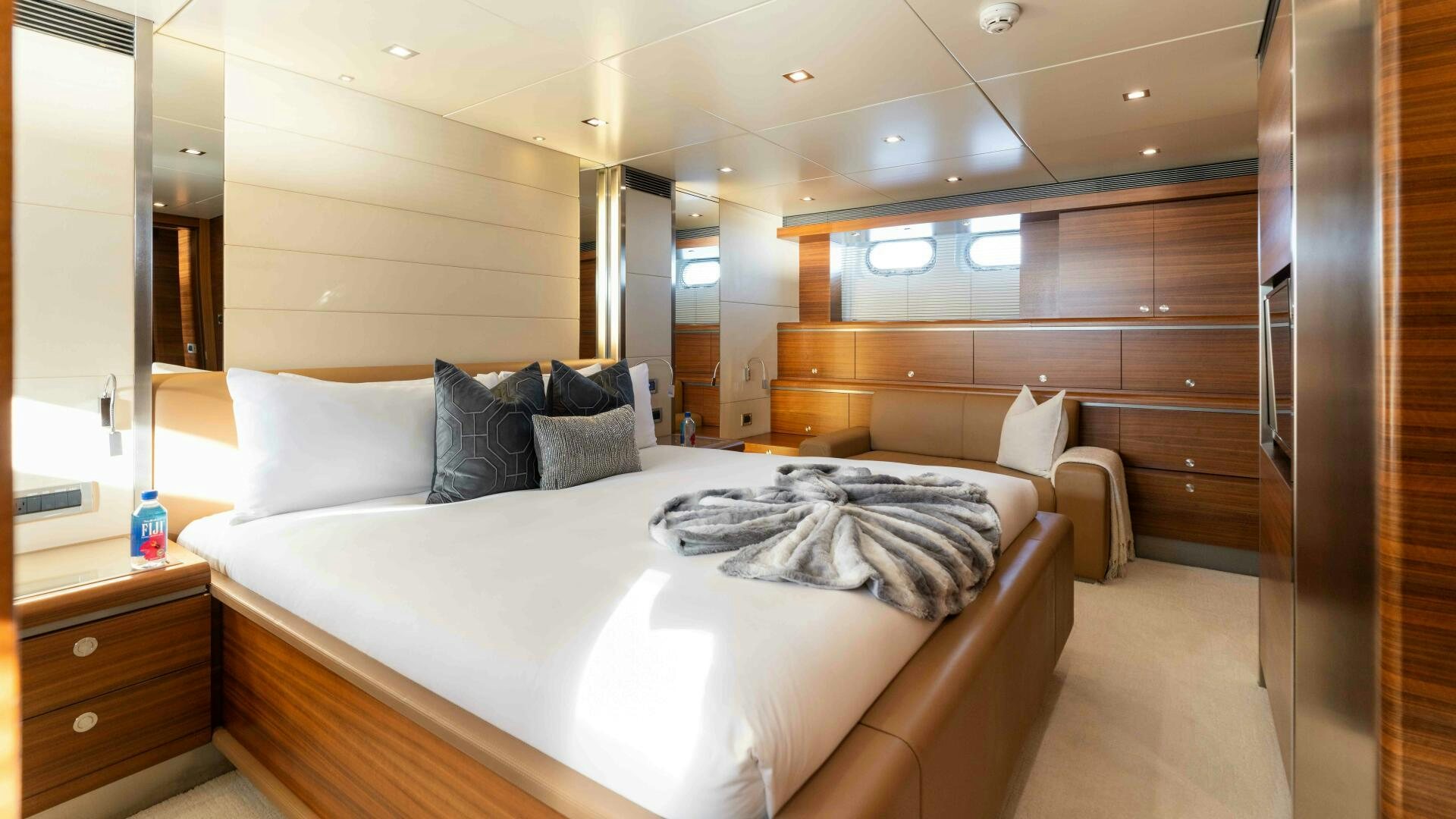a bed in a room aboard SEA AXIS Yacht for Sale