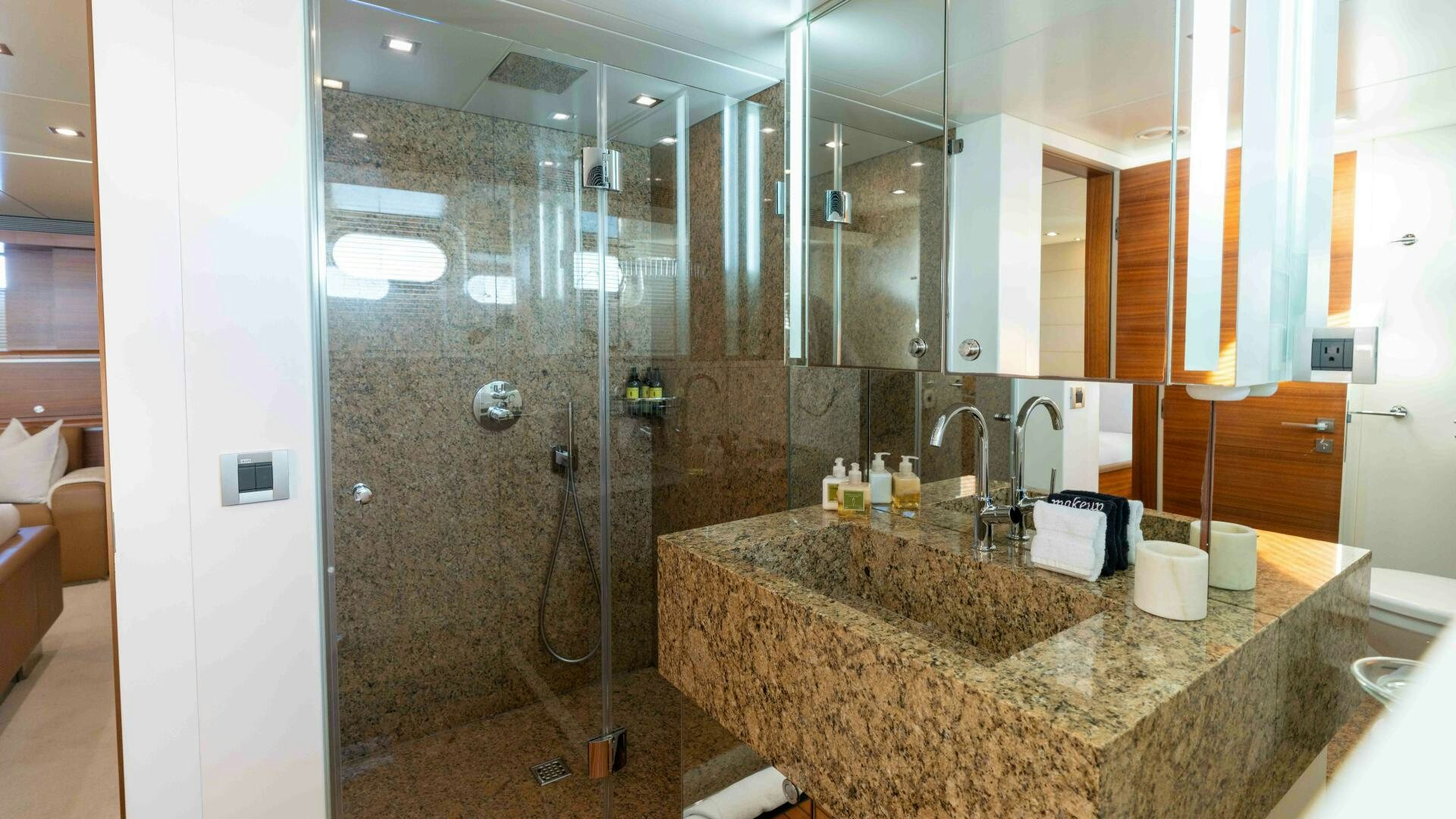 a bathroom with a marble counter top aboard SEA AXIS Yacht for Sale