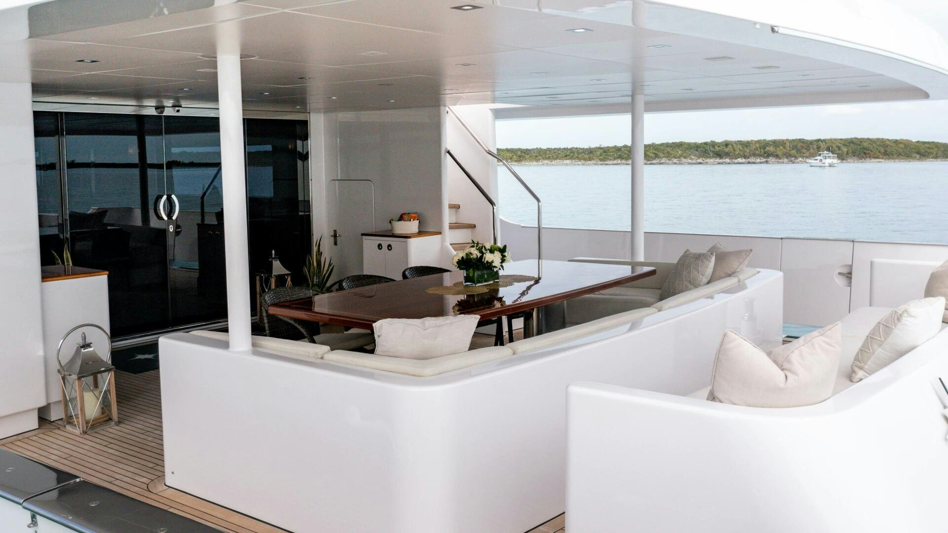 a room with a couch and a table aboard SEA AXIS Yacht for Sale