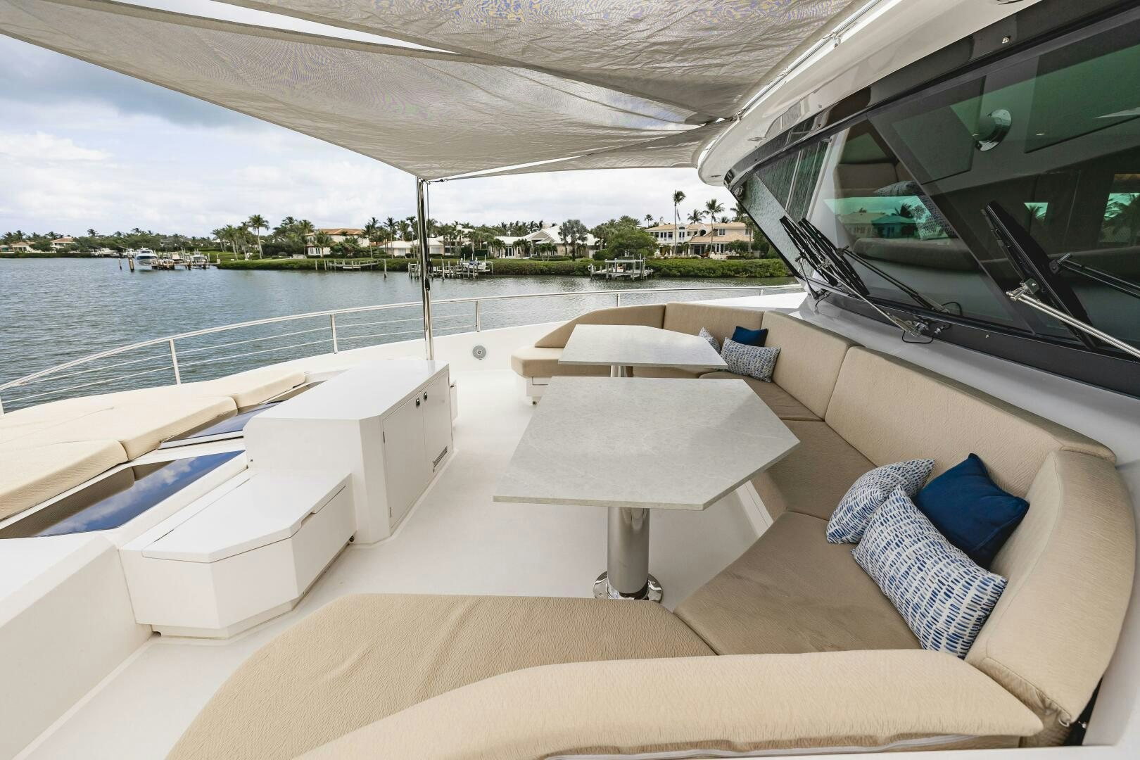 a room with a bed and a table on a boat aboard AQUA LIFE Yacht for Sale