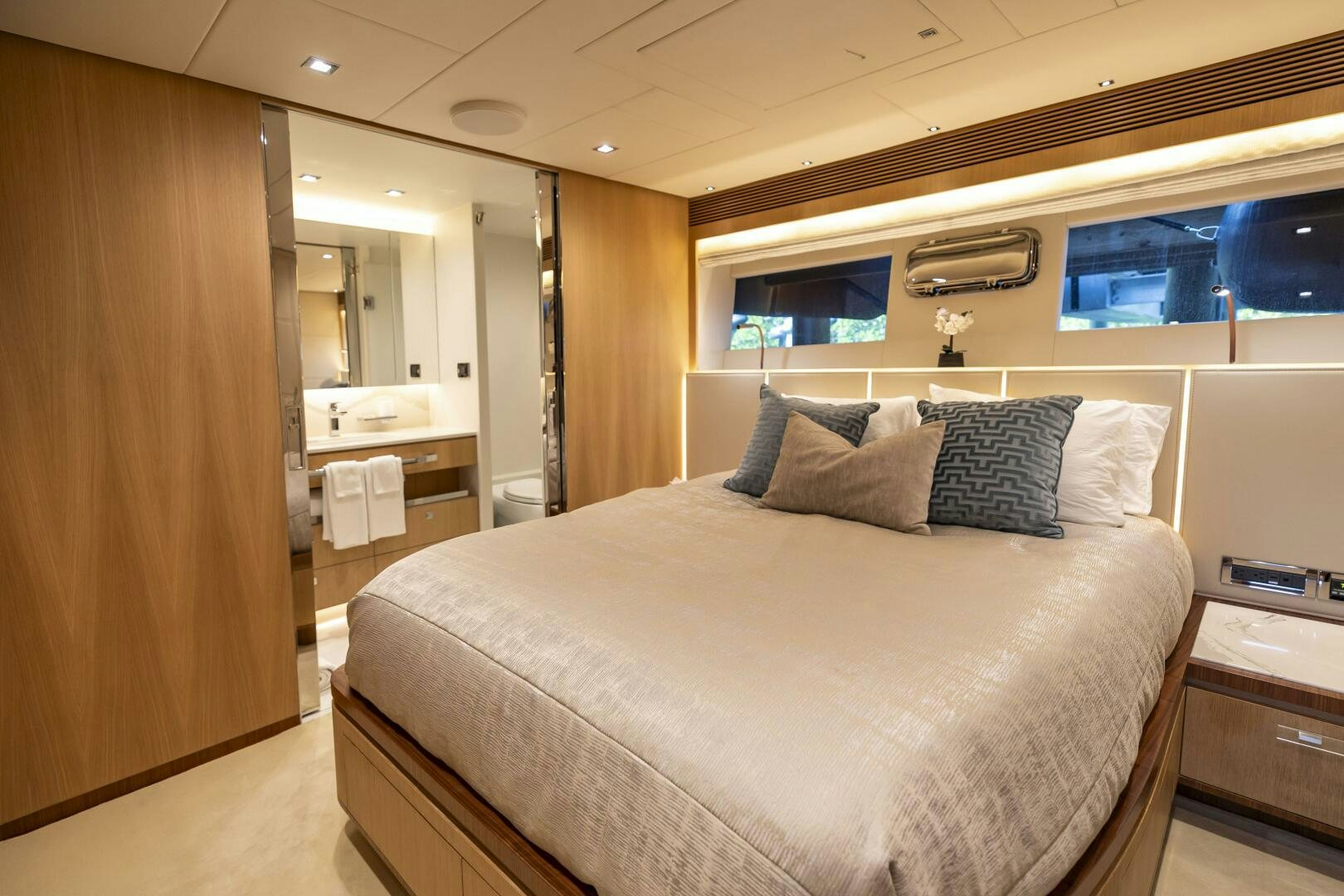 a bed in a room aboard AQUA LIFE Yacht for Sale