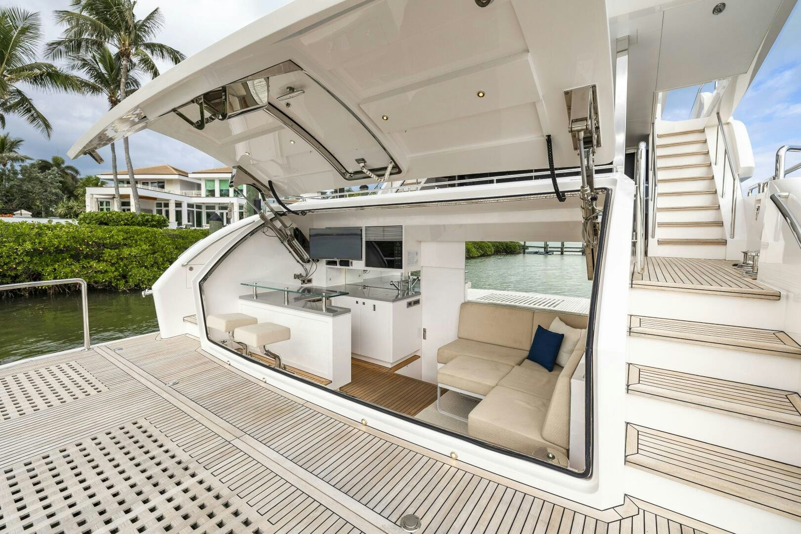 a white house with a pool aboard AQUA LIFE Yacht for Sale