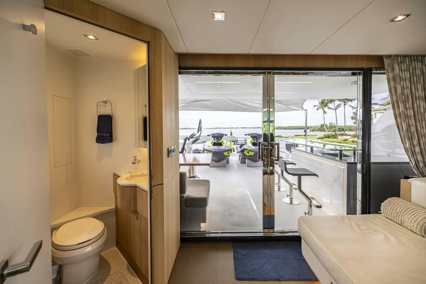 a bathroom with a glass door aboard AQUA LIFE Yacht for Sale