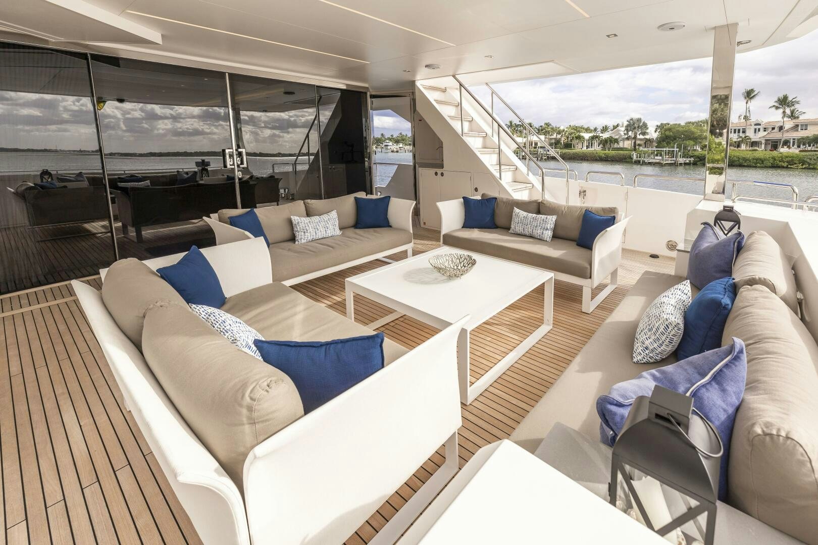 a living room with a patio aboard AQUA LIFE Yacht for Sale