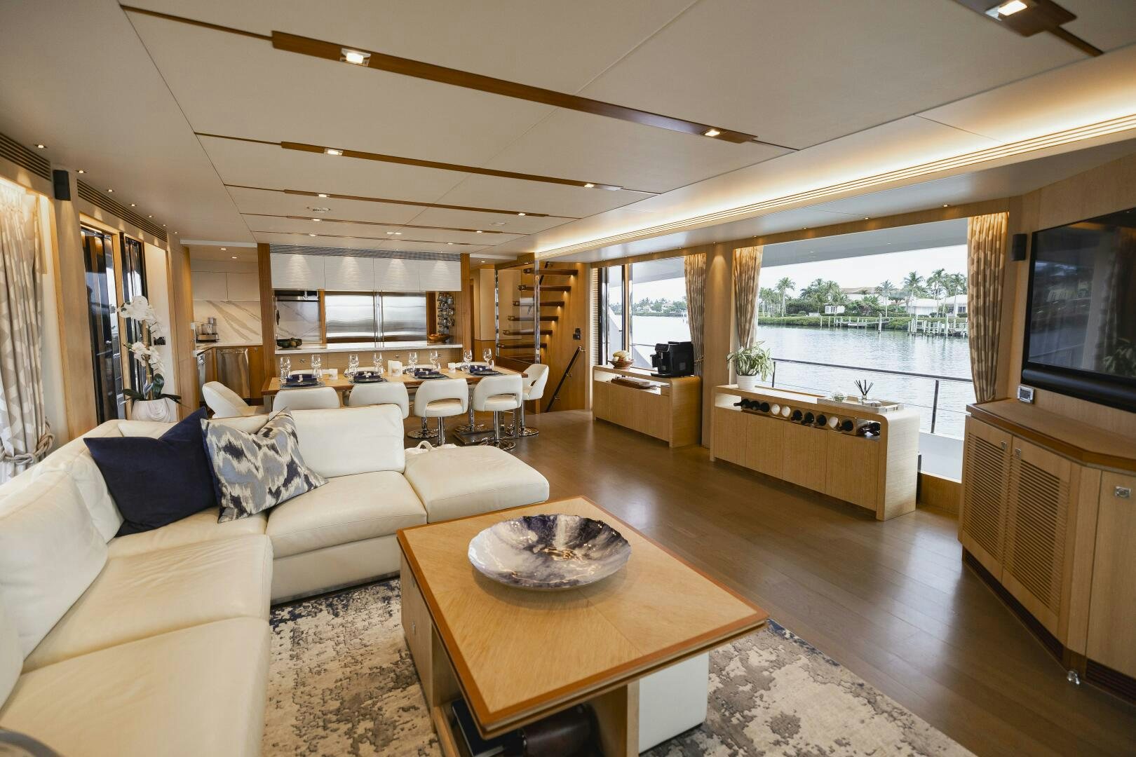 a living room with a large window aboard AQUA LIFE Yacht for Sale