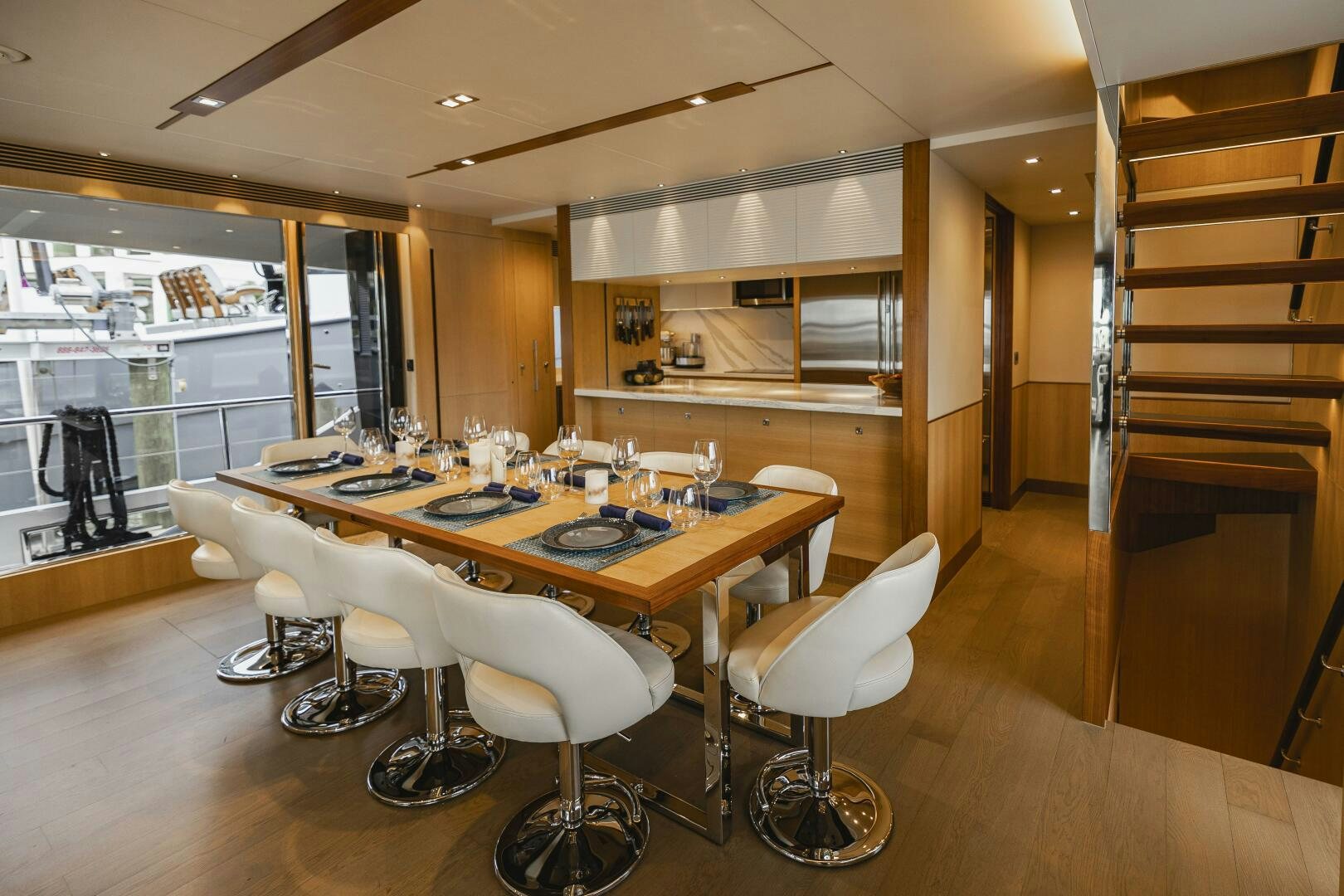 a dining room with a table aboard AQUA LIFE Yacht for Sale