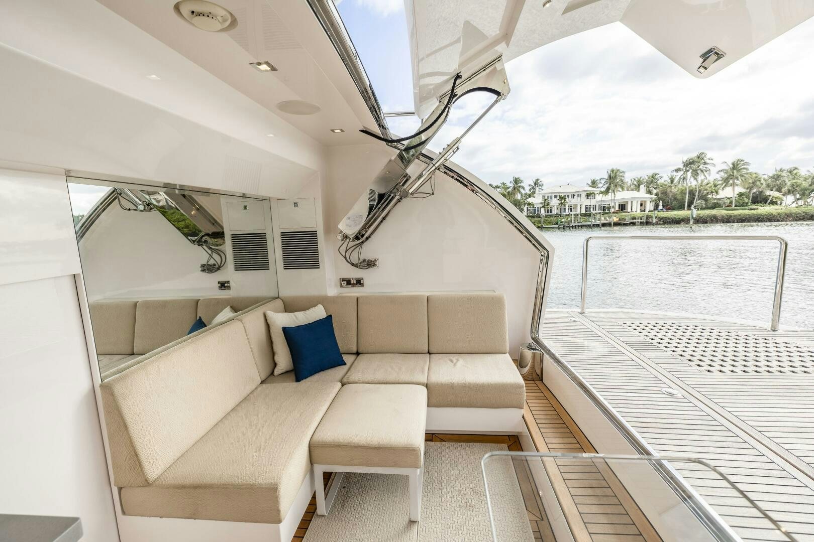 a white couch on a boat aboard AQUA LIFE Yacht for Sale