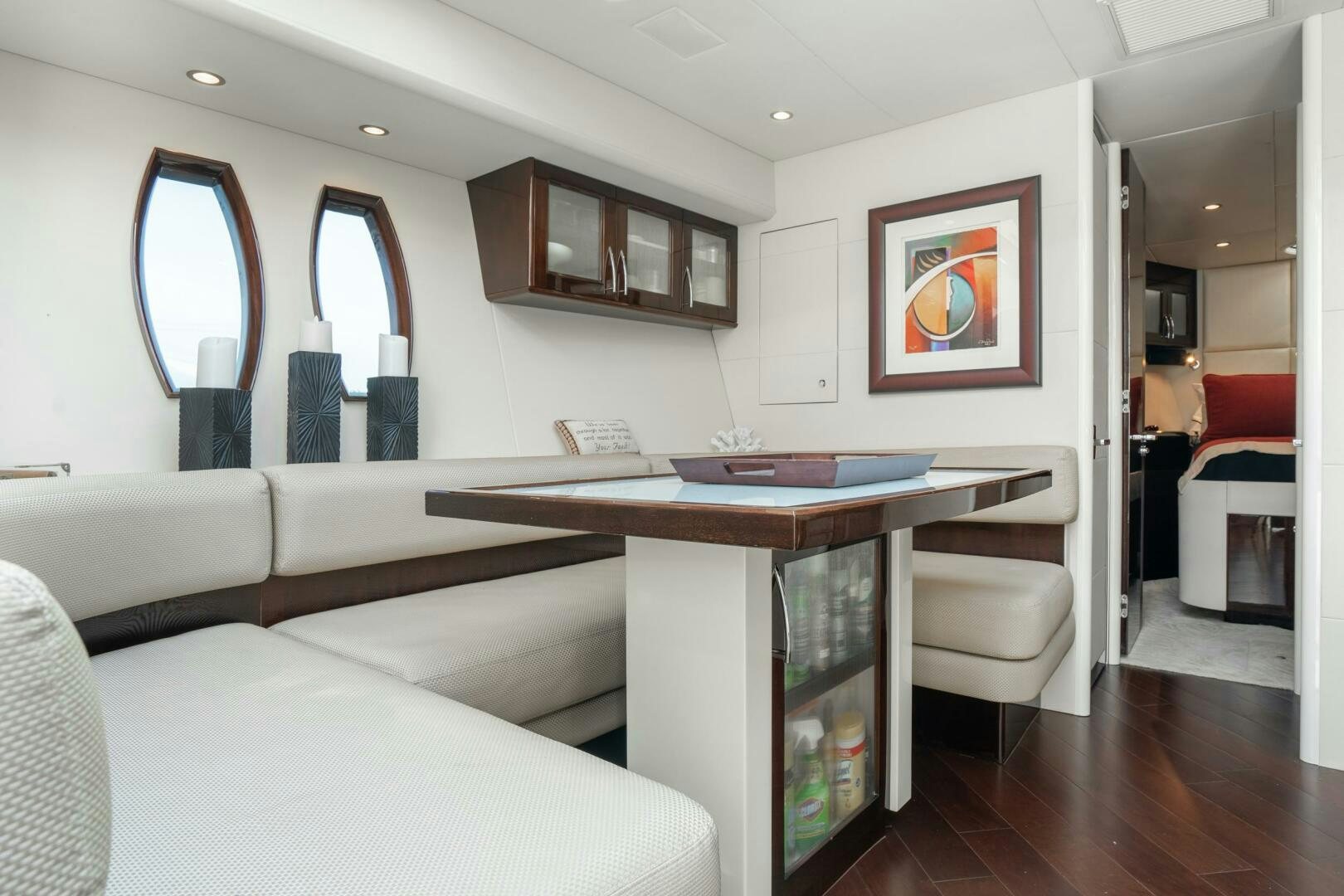 a room with a couch and a table aboard COMMITTED Yacht for Sale
