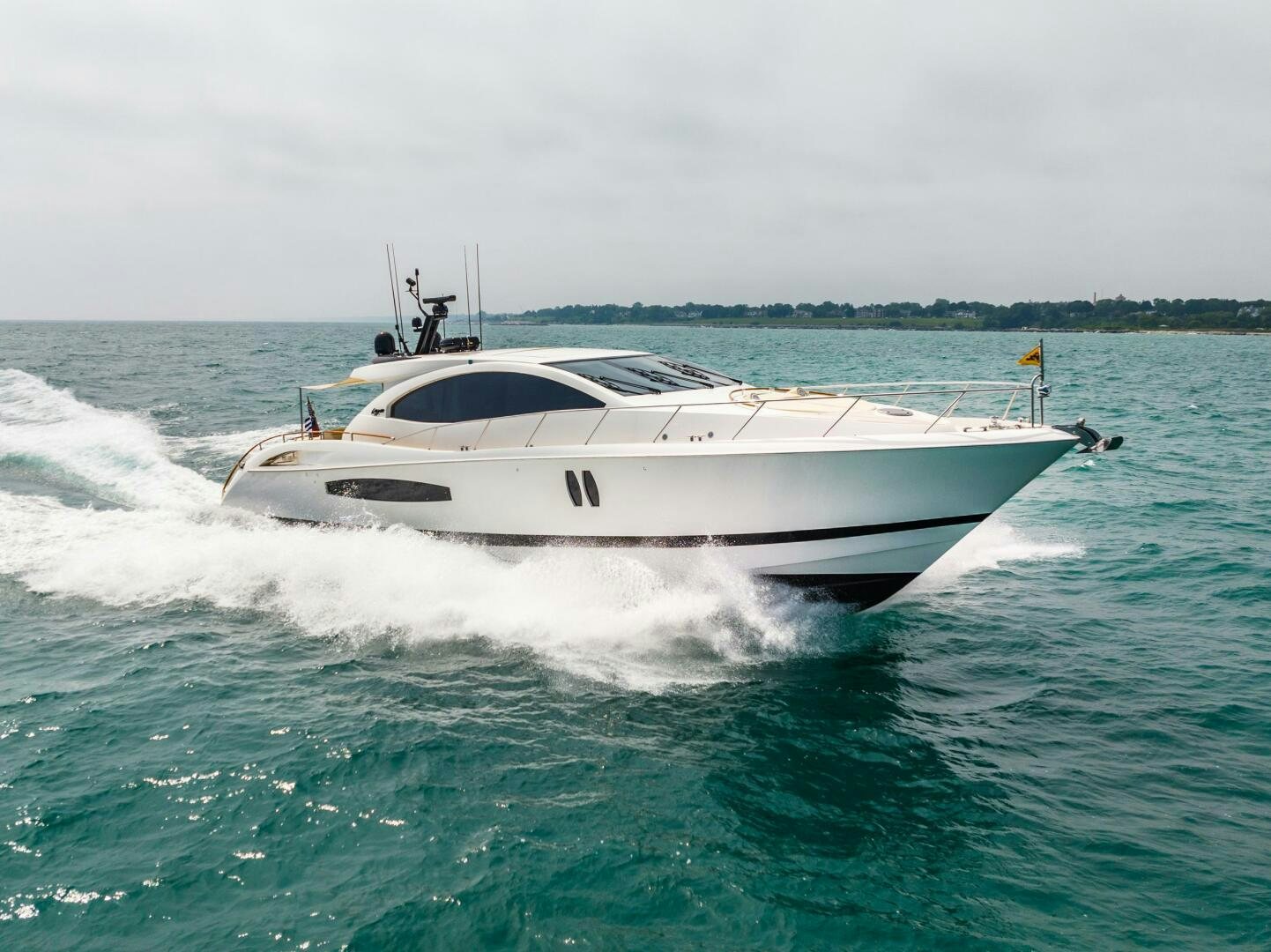 a white yacht on the water aboard COMMITTED Yacht for Sale