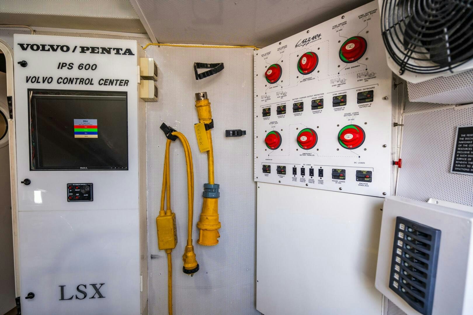 a yellow measuring tape on a white machine aboard COMMITTED Yacht for Sale
