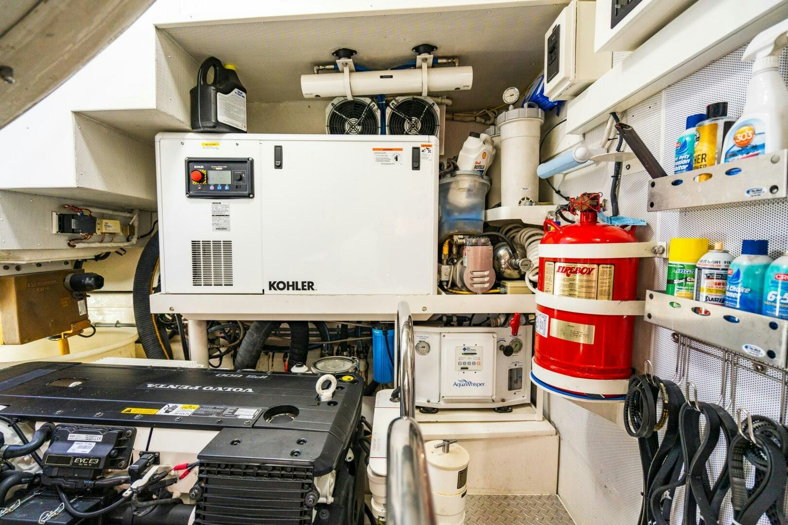 a room with machinery and shelves aboard COMMITTED Yacht for Sale