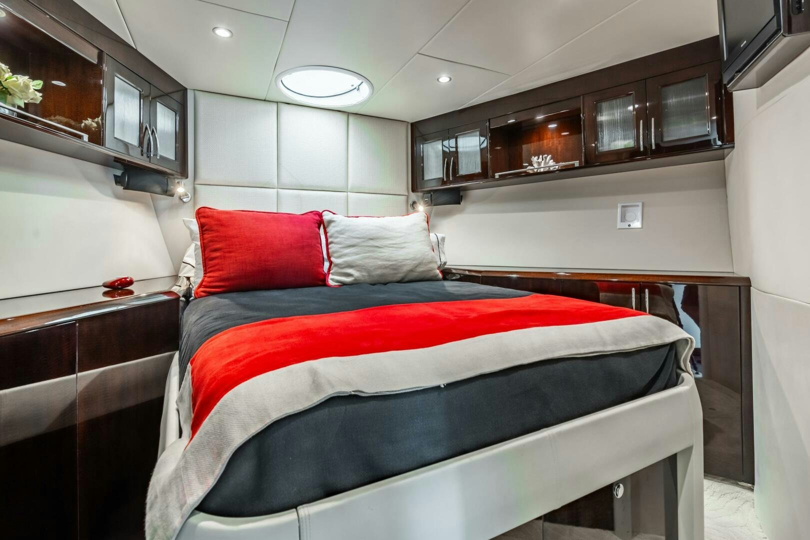 a bed in a room aboard COMMITTED Yacht for Sale
