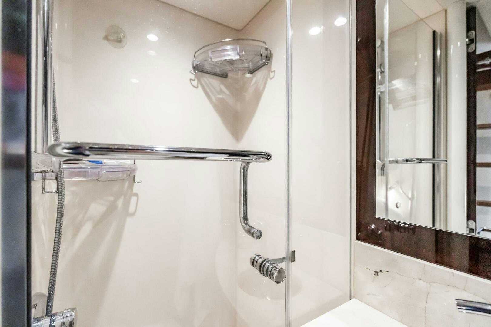 a shower with a glass door aboard COMMITTED Yacht for Sale