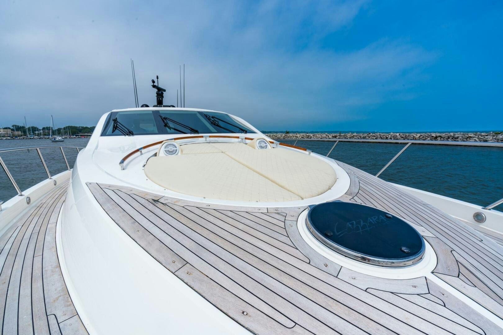 a white car on a boat aboard COMMITTED Yacht for Sale