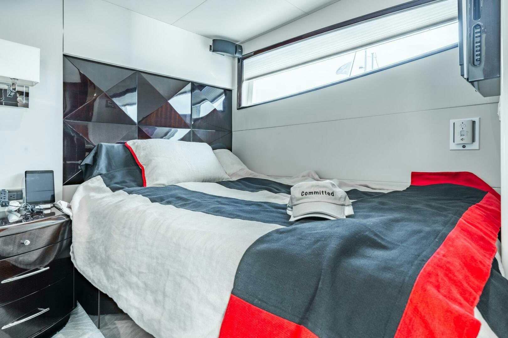 a couple of beds in a room aboard COMMITTED Yacht for Sale