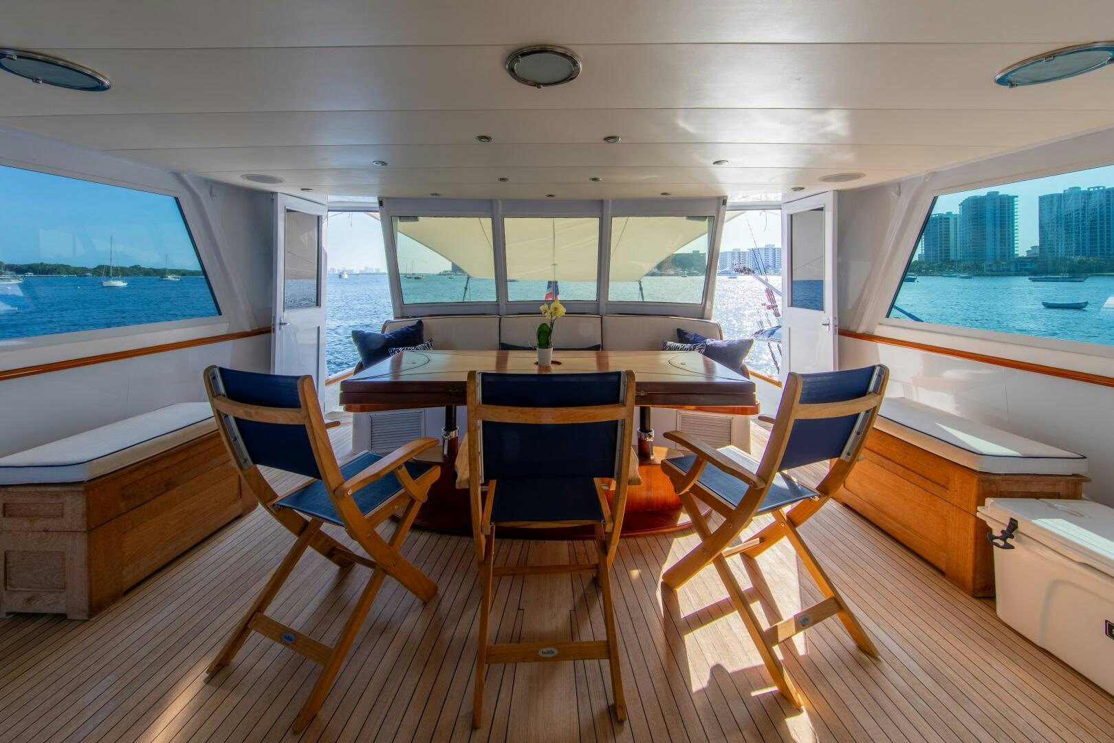 a room with a table and chairs aboard KOALA Yacht for Sale
