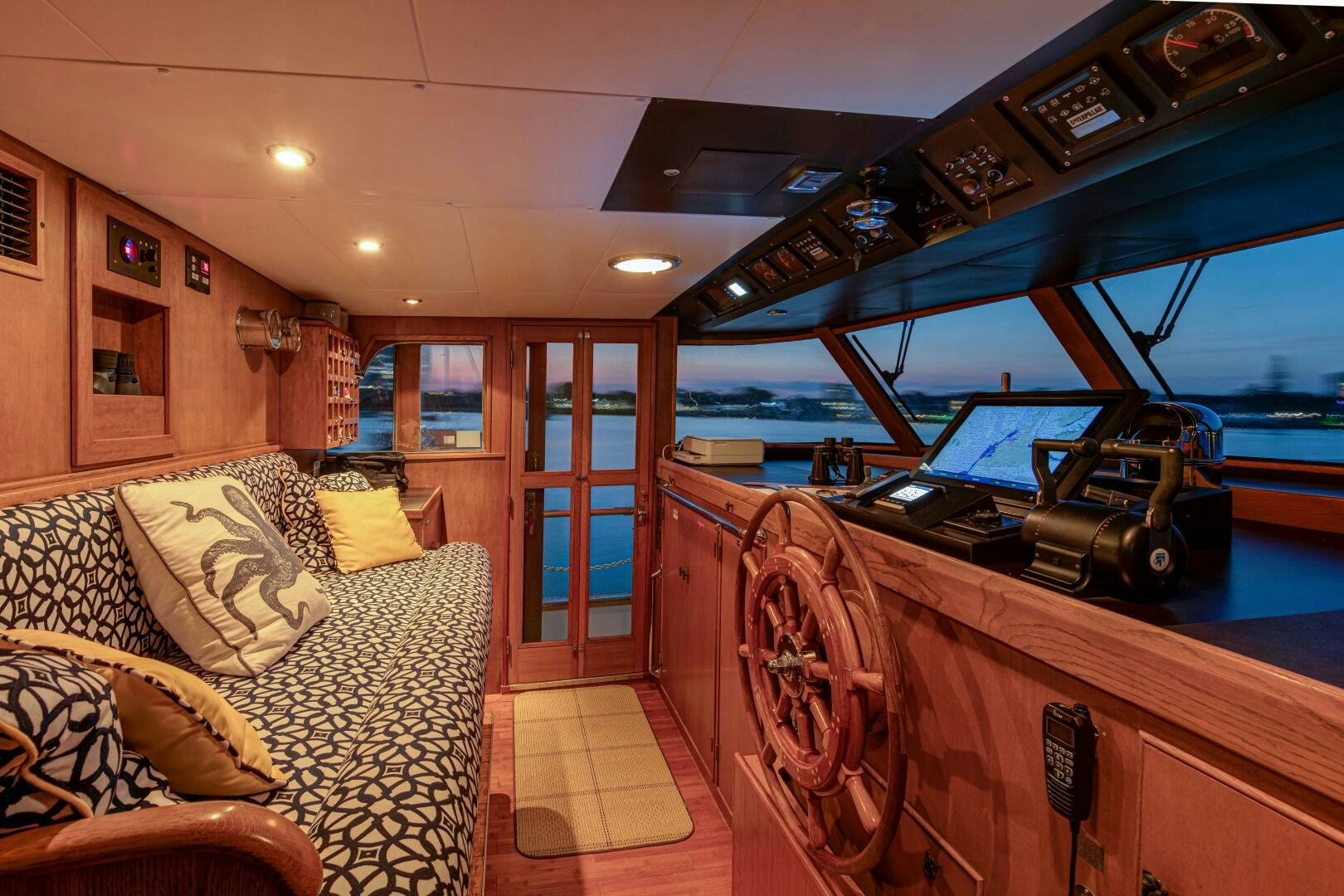 a room with a couch and a television set aboard KOALA Yacht for Sale