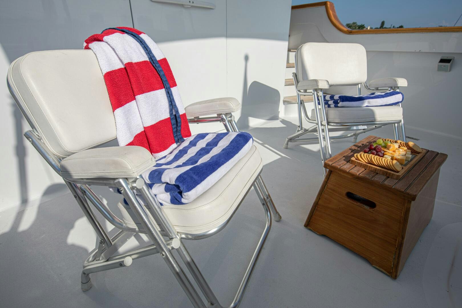 a room with chairs and a table aboard KOALA Yacht for Sale