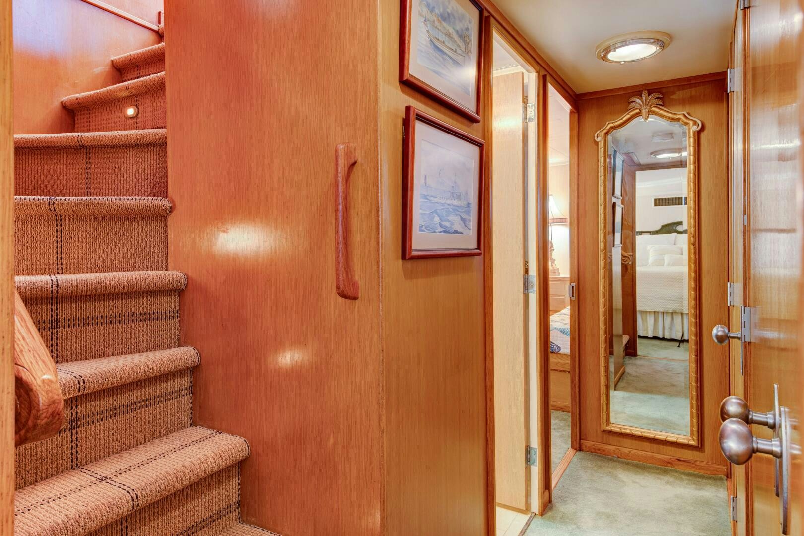 a room with a chair and a door aboard KOALA Yacht for Sale