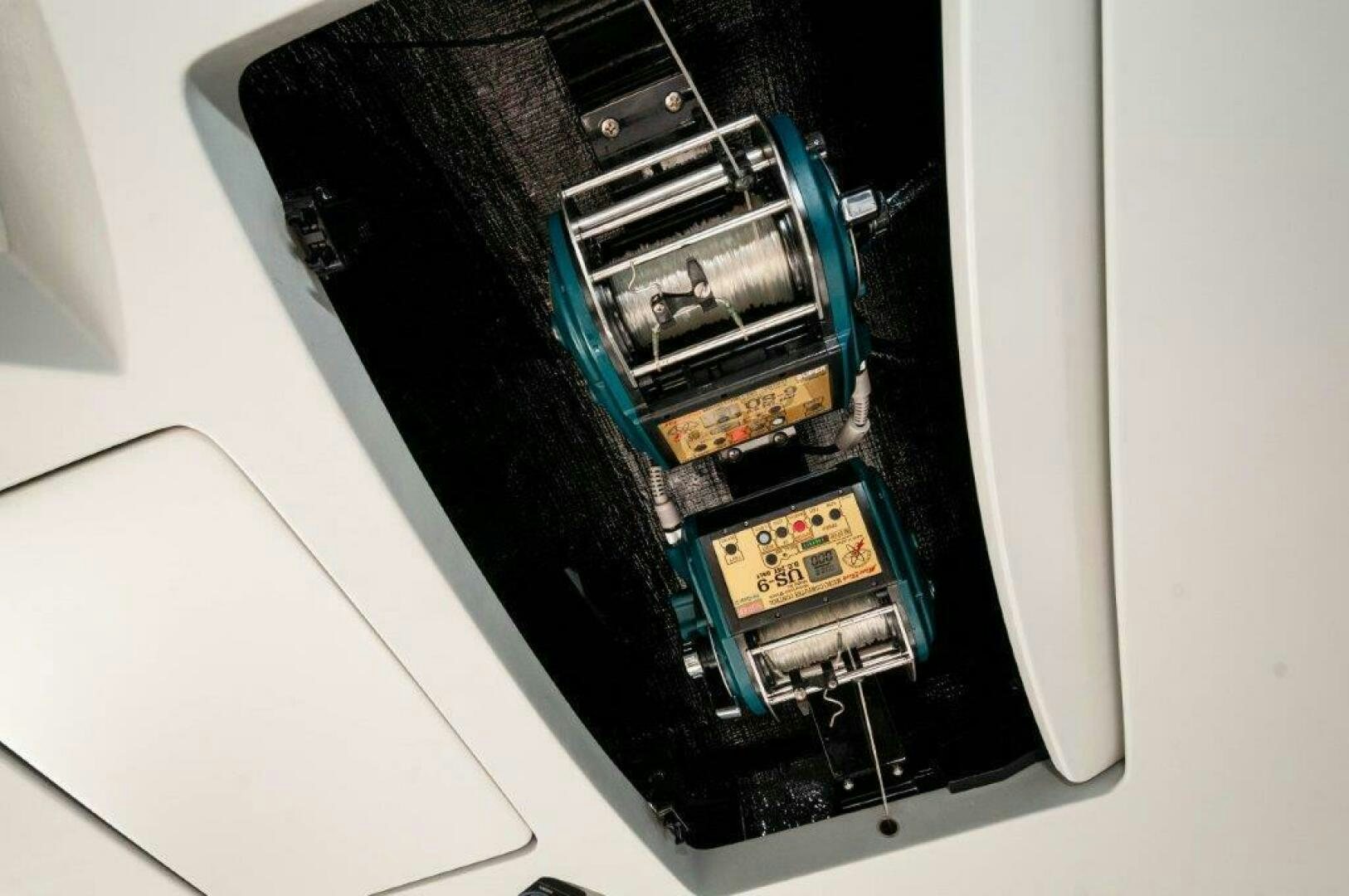 a computer with a blue and white object on it aboard FLEUR DE LIS Yacht for Sale