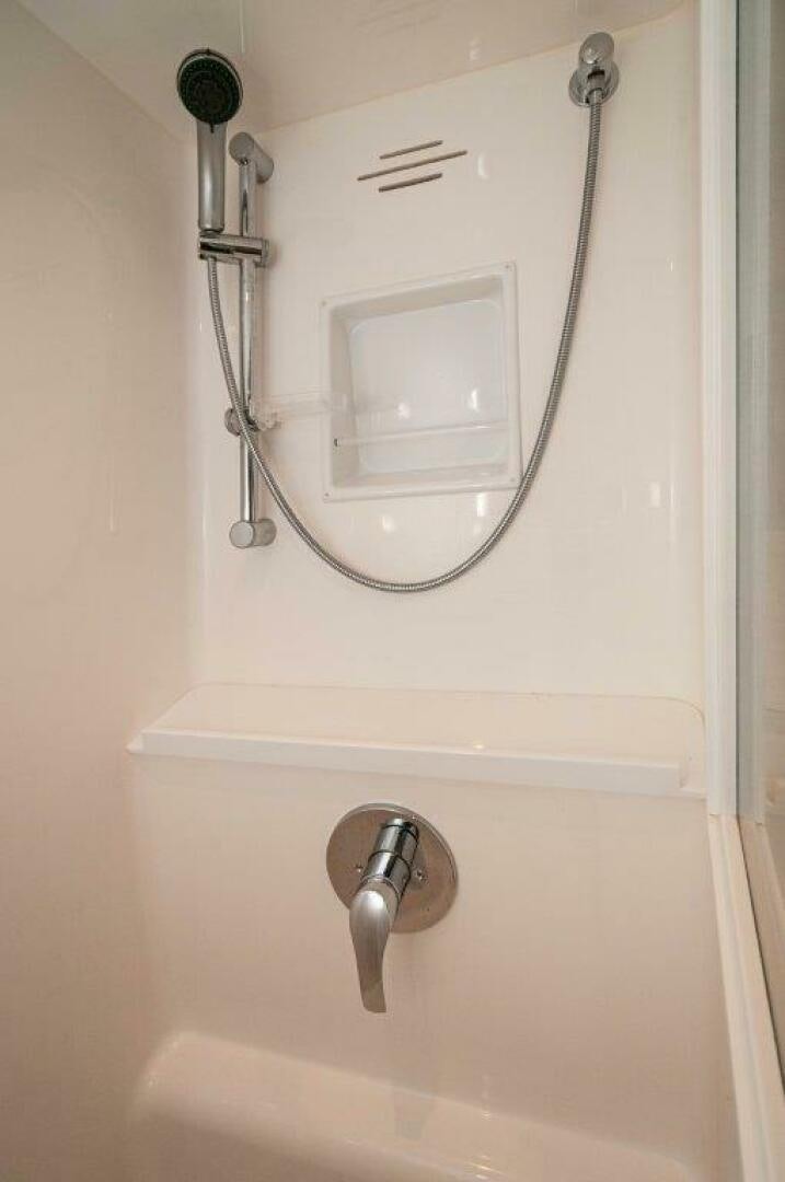 a bathroom with a mirror aboard FLEUR DE LIS Yacht for Sale