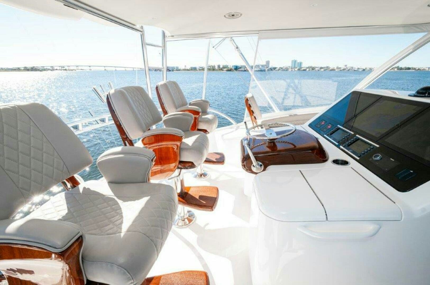 a yacht with a table and chairs aboard FLEUR DE LIS Yacht for Sale