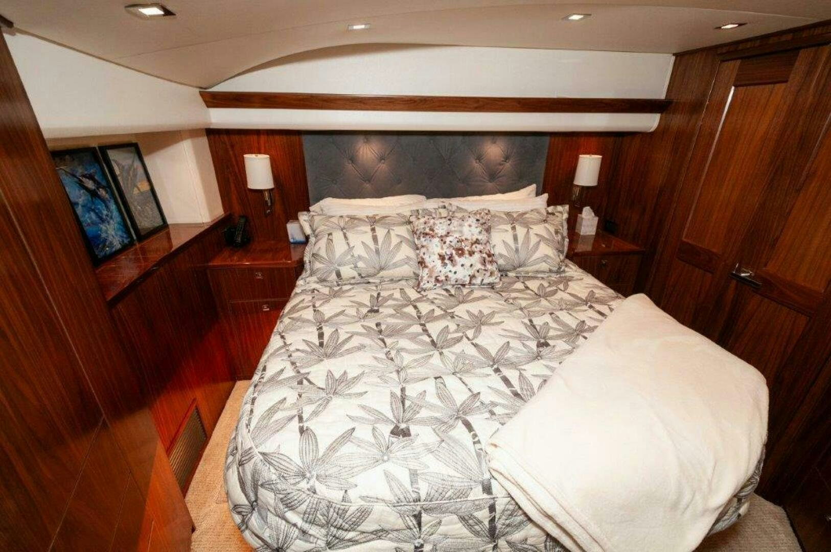 a person lying on a bed aboard FLEUR DE LIS Yacht for Sale