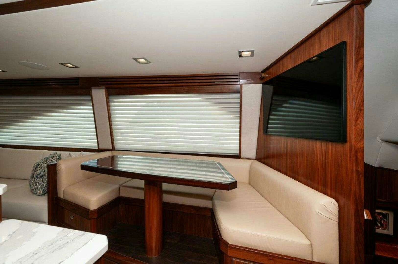 a room with a couch and a table aboard FLEUR DE LIS Yacht for Sale