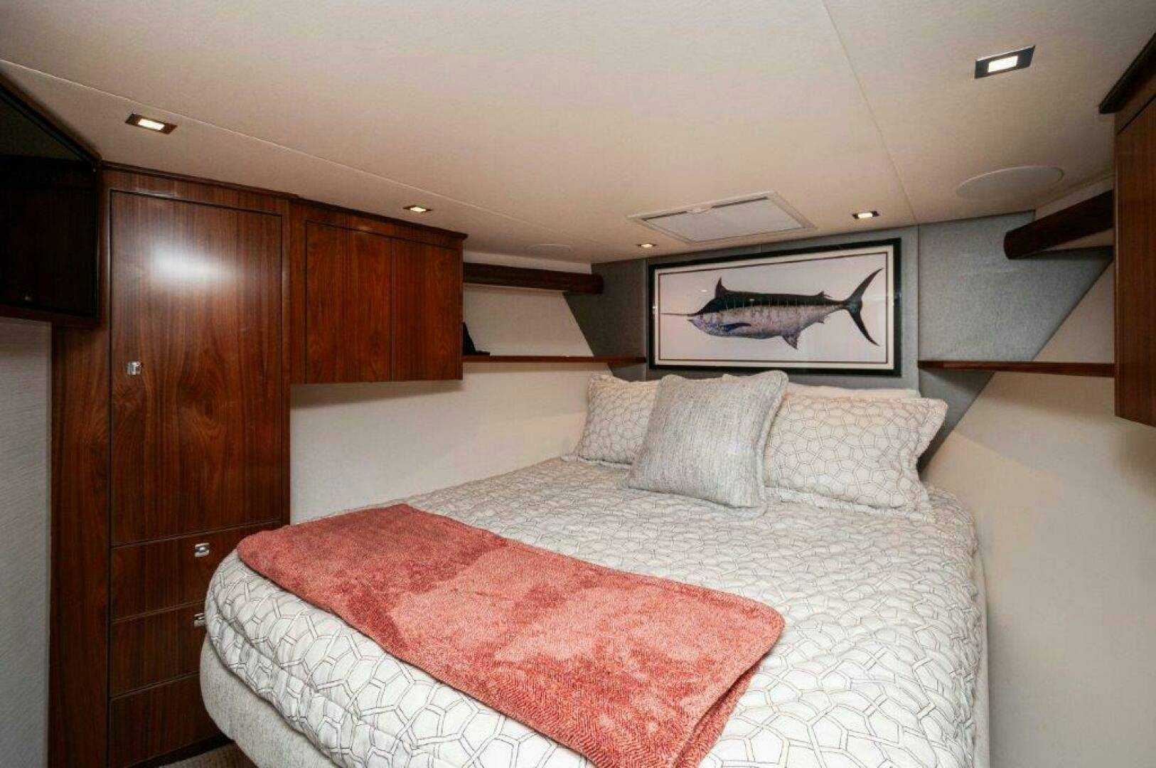 a bed in a room aboard FLEUR DE LIS Yacht for Sale