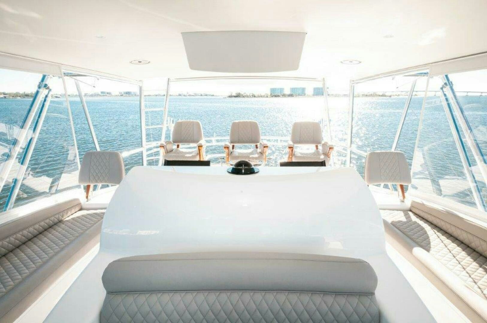 a boat with chairs on it aboard FLEUR DE LIS Yacht for Sale
