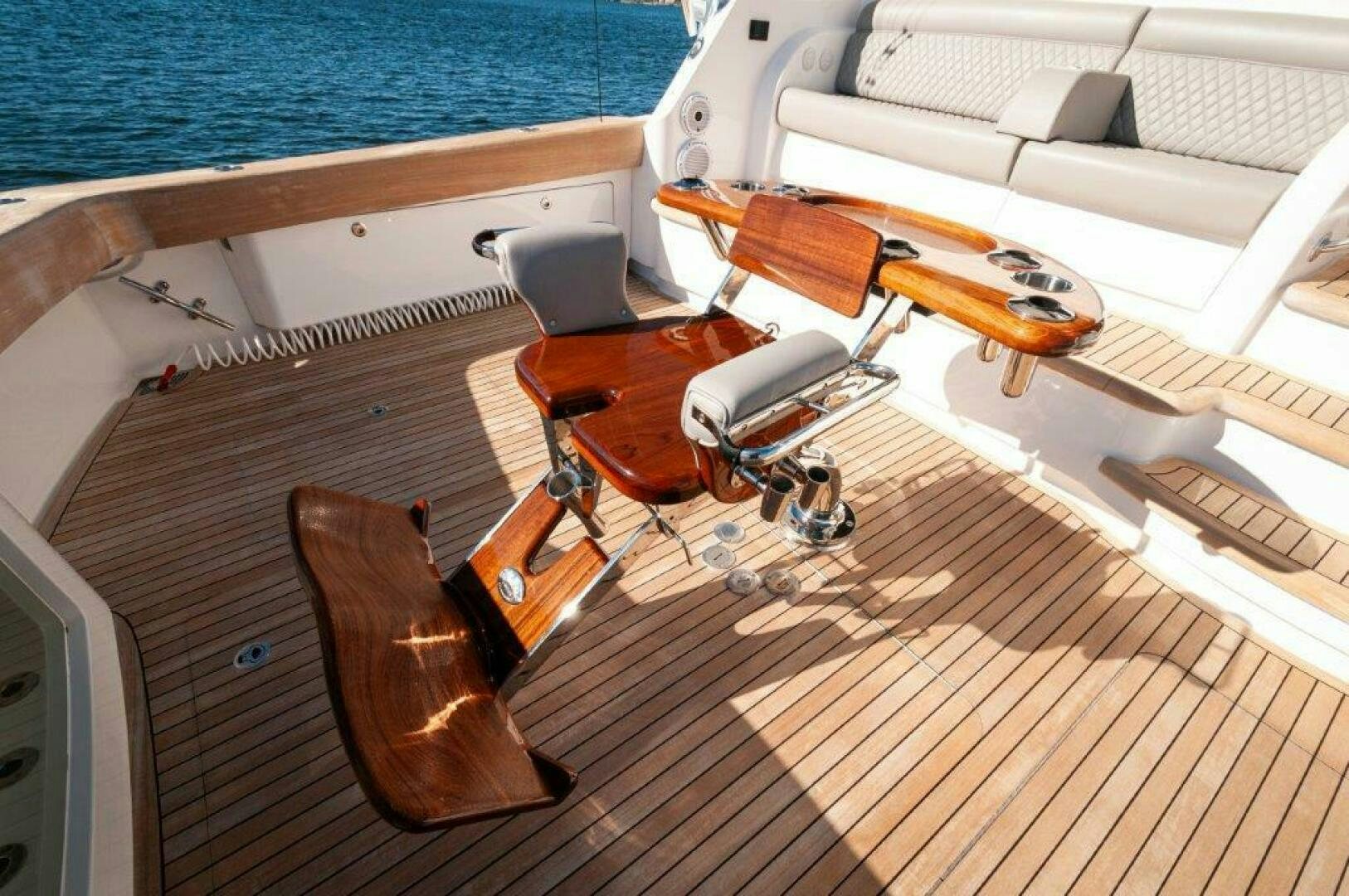 a wooden boat on a deck aboard FLEUR DE LIS Yacht for Sale