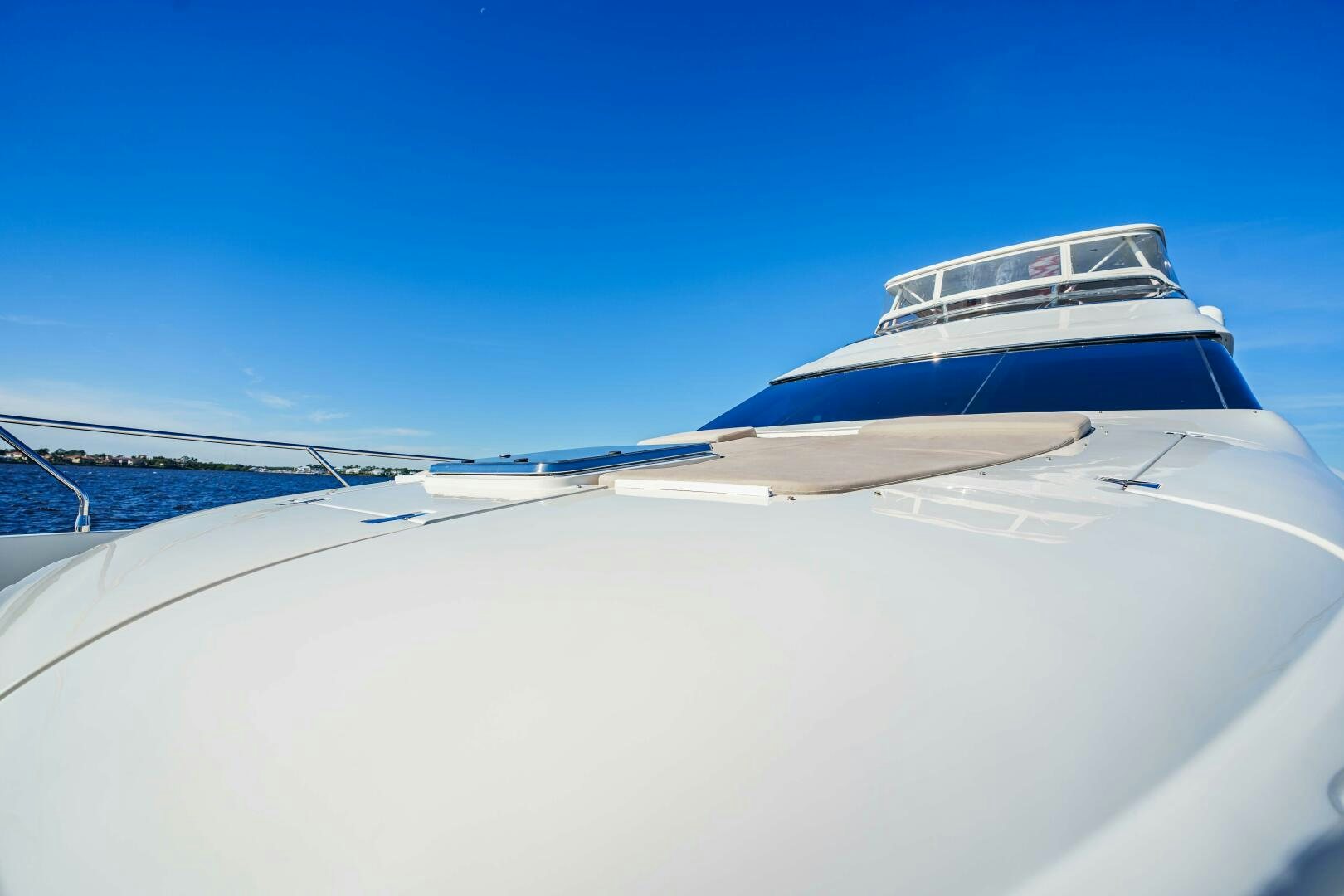 a white yacht on the water aboard SERENITY Yacht for Sale