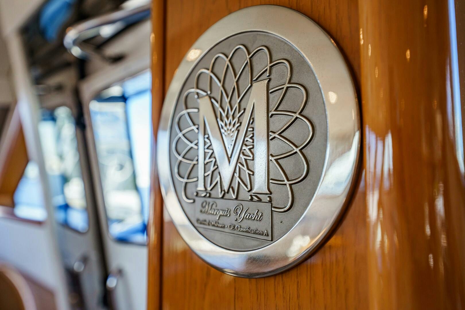 a close-up of a logo aboard SERENITY Yacht for Sale