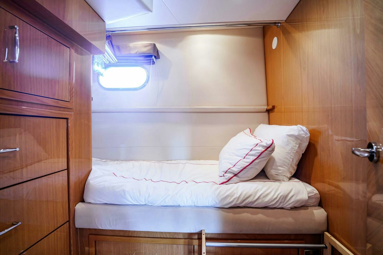 a bed in a room aboard SERENITY Yacht for Sale
