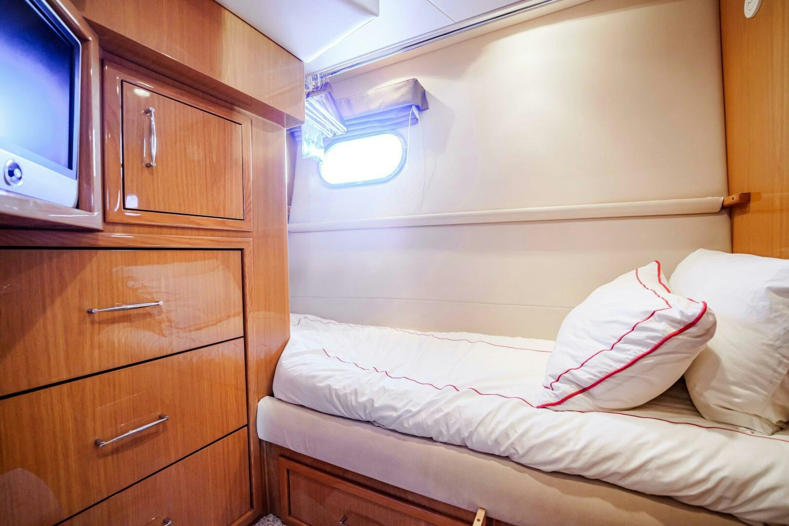 a bed in a room aboard SERENITY Yacht for Sale