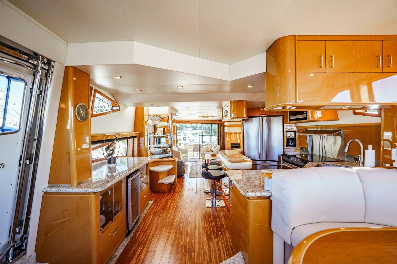 a large kitchen with a large window aboard SERENITY Yacht for Sale