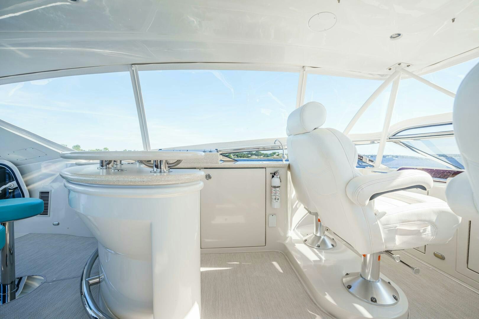 a white boat with a seat aboard SERENITY Yacht for Sale
