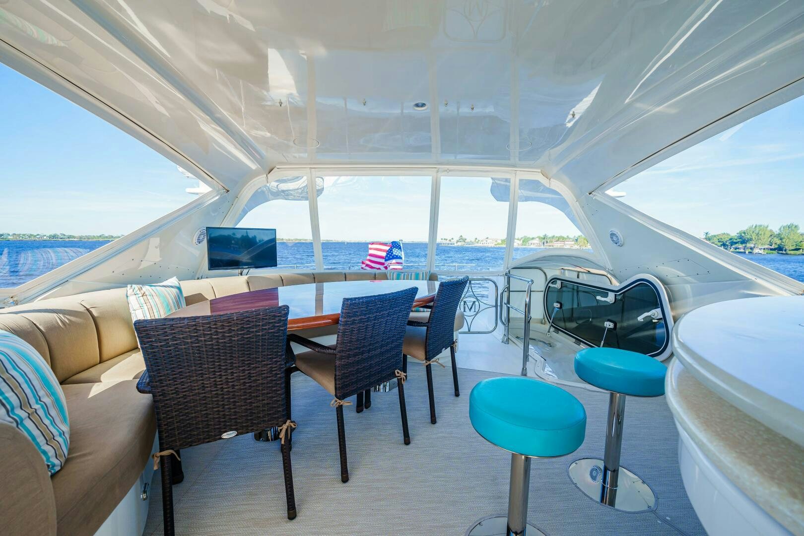 a tent with chairs and tables aboard SERENITY Yacht for Sale