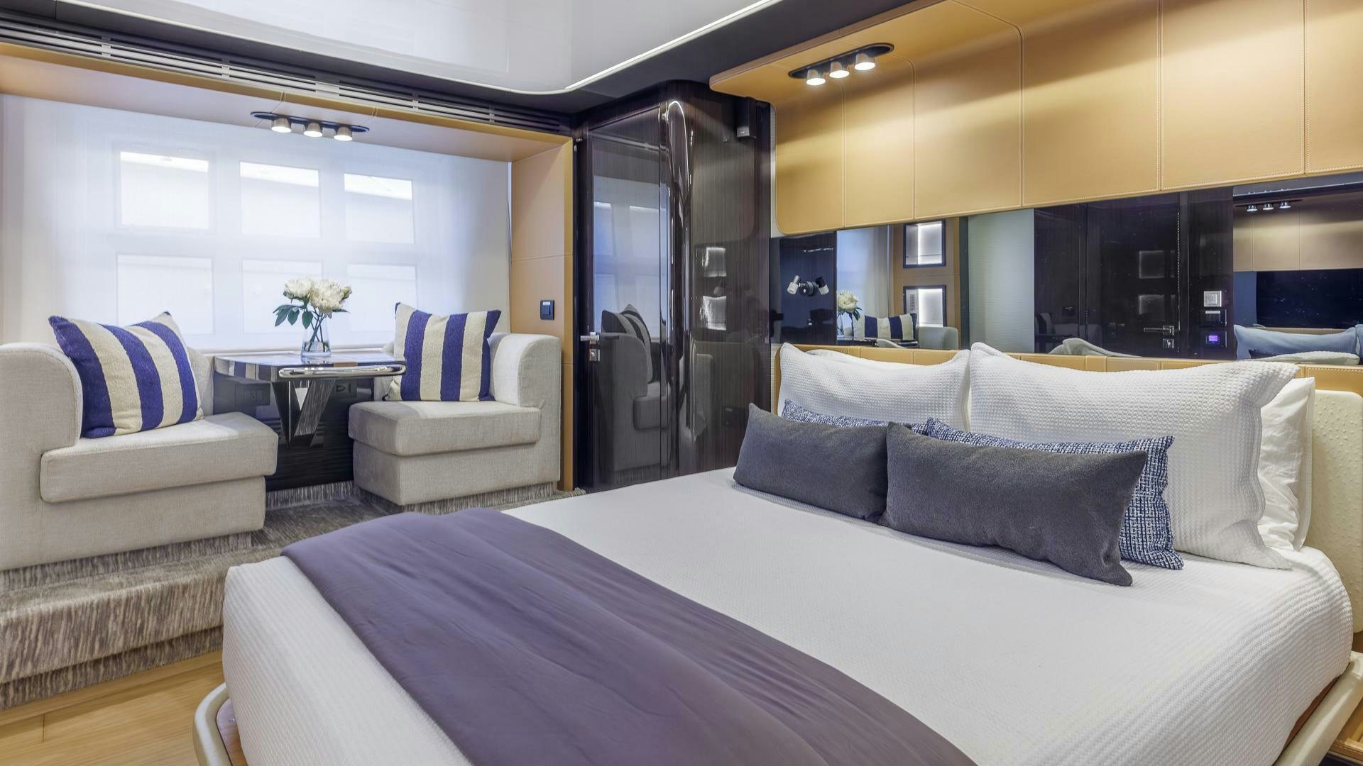 a large bed in a room aboard DEVENZO Yacht for Sale