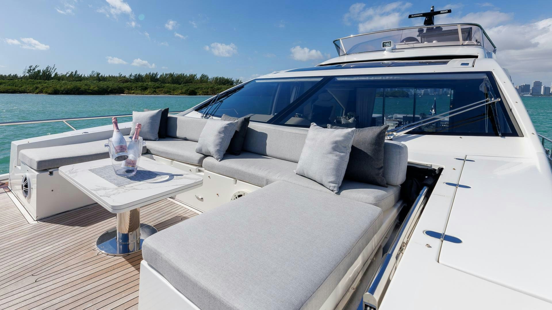 a white yacht on a deck aboard DEVENZO Yacht for Sale